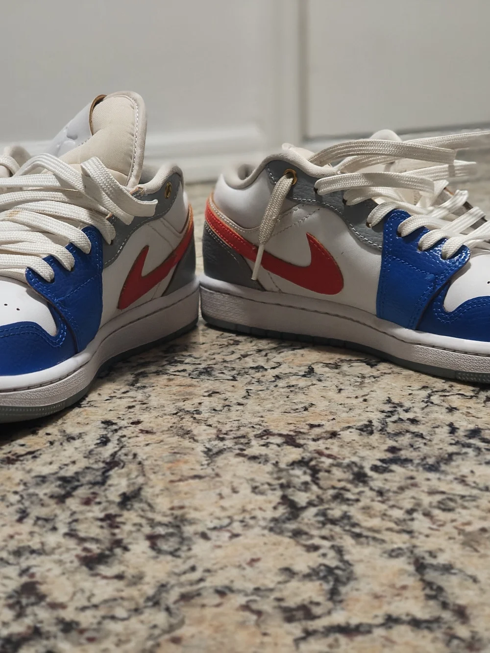Jordan Men’s Low-Top Sneakers in White, Blue, Red